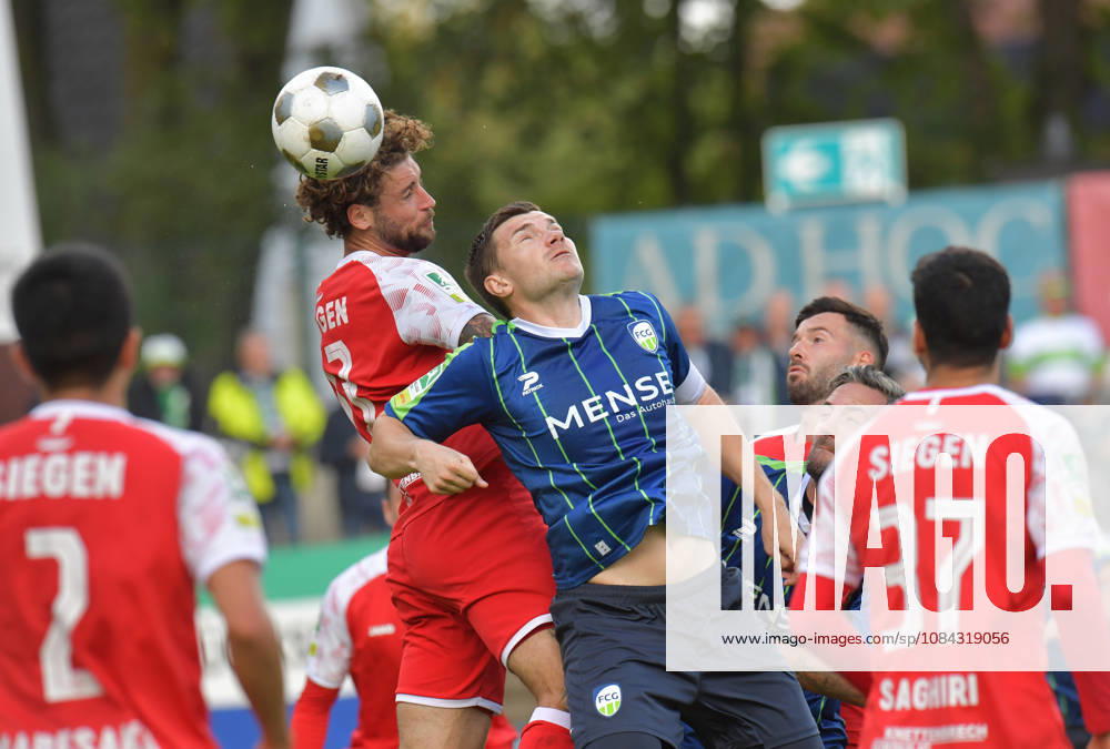 GER, Soccer, Regionalliga West, 2026–2027 Season, Matchday 12, Ohlendorf Stadium in Heidewald, Gütersloh FC vs. SF Siegen 0–5, Björn Rother (FC Gütersloh, right) vs. Jan Luca Rumpf (SF Siegen), action, duel, tackle, header