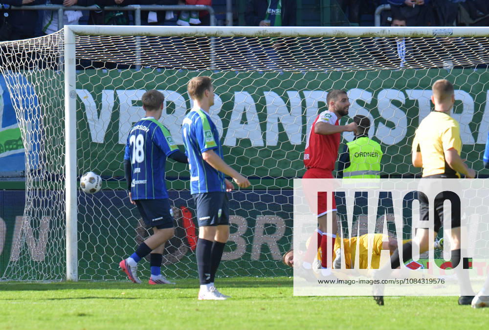 GER, Soccer, Regionalliga West, 2026–2027 Season, Matchday 12, Ohlendorf Stadium in Heidewald, Gütersloh FC vs. SF Siegen 0–5; Goal scorer: Jan Luca Rumpf (SF Siegen); not pictured: Jarno Peters, who scored the 0–3 goal; FC Gütersloh is helpless; action; still image; landscape orientation; goal; score; penalty area scene