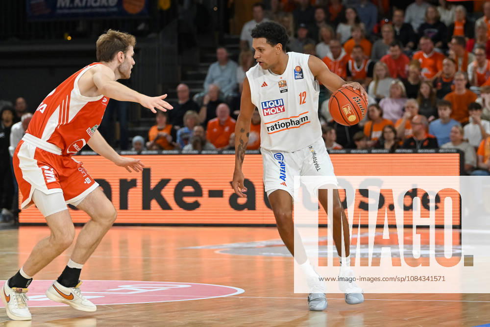 Michael Rataj (ratiopharm Ulm), No. 12, with the ball against Linus Trettin (RASTA Vechta), No. 15; RASTA Vechta vs. ratiopharm Ulm, easyCredit Basketball Bundesliga, Matchday 5, 2026–2027 season, October 10, 2026, RASTA Vechta vs. ratiopharm Ulm, easyCredit Basketball Bundesliga, Matchday 5, 2026–2027 season, October 10, 2026, Vechta