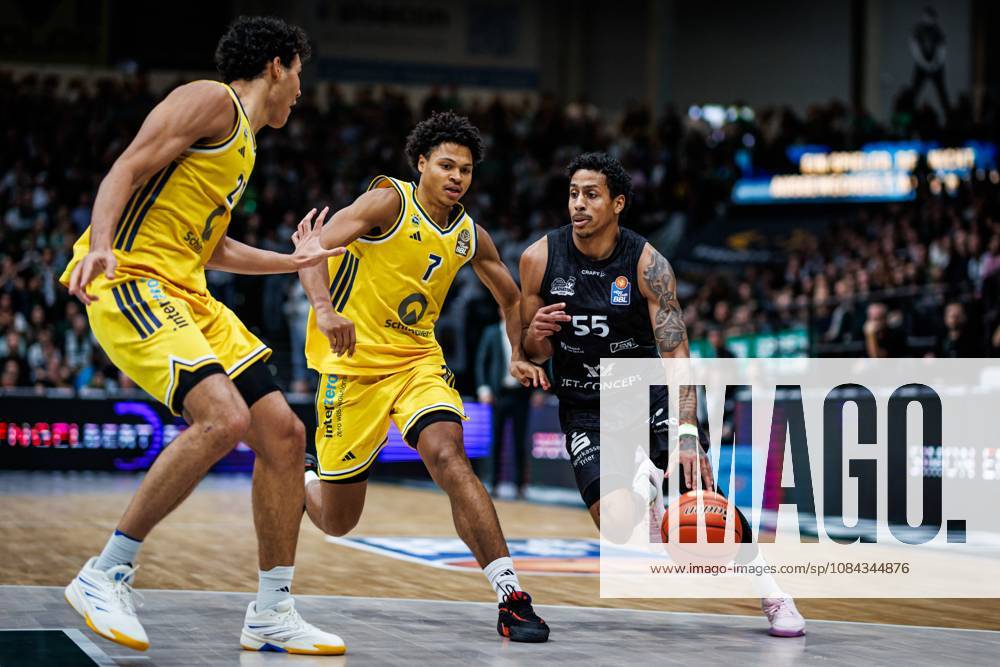 Eli Brooks of the Gladiators Trier goes head-to-head with Brandon Angel of Alba Berlin and Jack Kayil of Alba Berlin; Action: Vet Concept Gladiators Trier vs. Alba Berlin, Basketball, easyCredit BBL, Matchday 5, 2026–2027 Season, October 10, 2026, Vet Concept Gladiators Trier vs. Alba Berlin, Basketball, easyCredit BBL, Matchday 5, 2026–2027 season