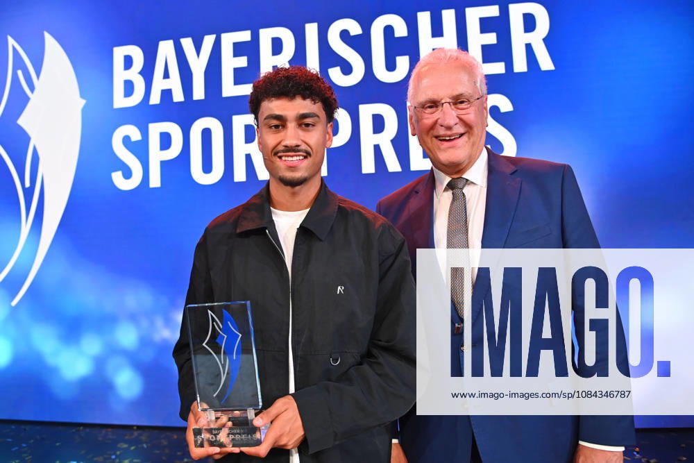 Nathaniel BROWN of Bayern Munich receives his award from Joachim HERRMANN, Bavarian Minister of the Interior, at the 2026 Bavarian Sports Awards at BMW Welt, Red Carpet, on October 10, 2026