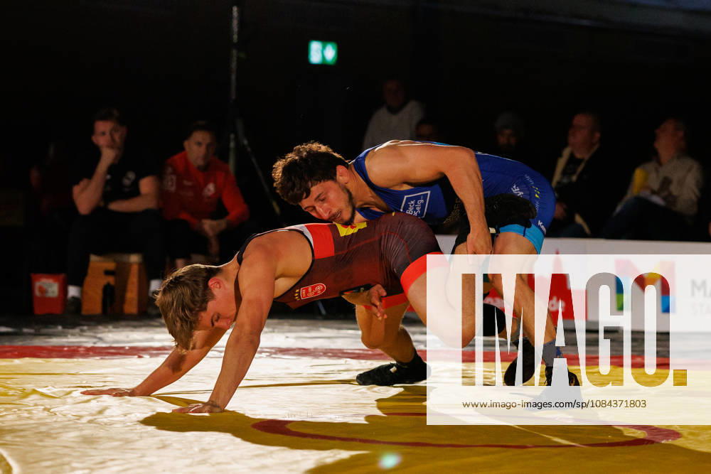 DRB BIRTAT Bundesliga, Day 6 of Competition, ASV Mainz 88 vs. KG Baienfurt Ravensburg, Mainz, October 10, 2026 Match between John Keterling (red), ASV Mainz 88, and Norik Harutyunyan (blue), KG Baienfurt Ravensburg, freestyle up to 61 kg DRB BIRTAT Bundesliga, Day 6 of Competition, ASV Mainz 88 vs. KG Baienfurt Ravensburg, Sporthalle am Großen Sand, Mainz