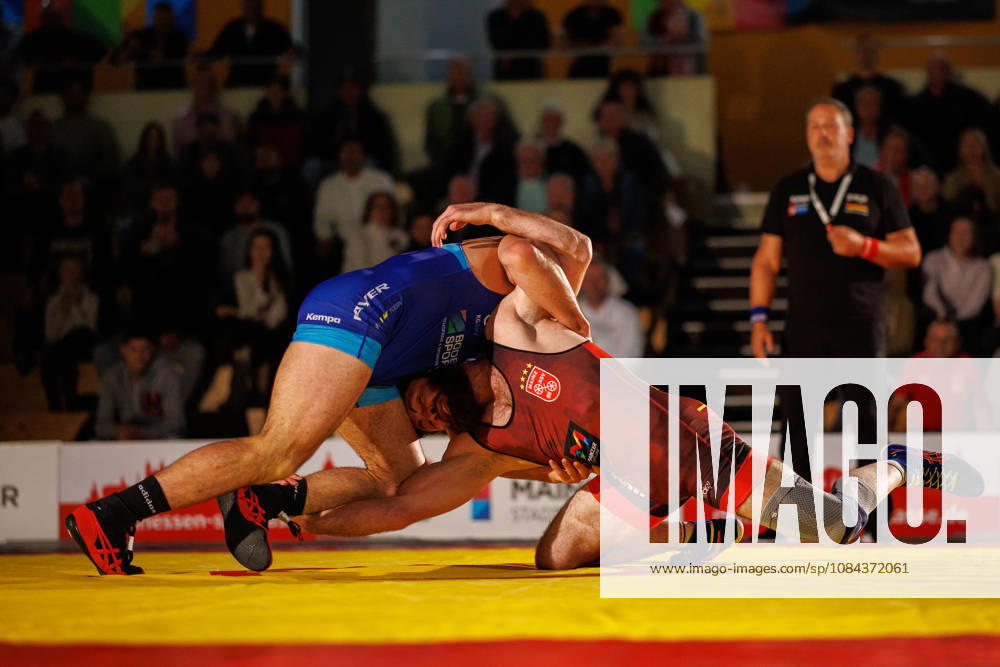 DRB BIRTAT Bundesliga, Day 6 of Competition, ASV Mainz 88 vs. KG Baienfurt Ravensburg, Mainz, October 10, 2026. Match between Malik Shavaev (red), ASV Mainz 88, and Radu Lefter (blue), KG Baienfurt Ravensburg, 98 kg freestyle, DRB BIRTAT Bundesliga, Day 6 of competition, ASV Mainz 88 vs. KG Baienfurt Ravensburg, Sporthalle am großen Sand, Mainz
