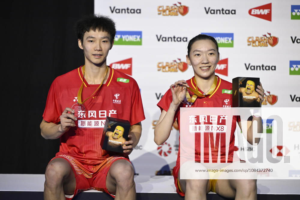 Wei Ya Xin (L) and Jiang Zhen Bang (R) of China pose with their medals after they won the mixed doubles final at the badminton Clash of Clans Arctic Open 2026 tournament in Vantaa, Finland, on October 11, 2026. - ANTTI AIMO-KOIVISTO Finland SC2S5b629gk