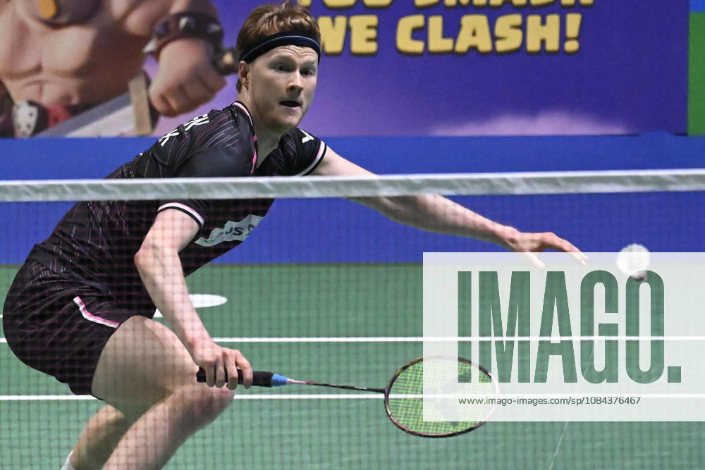 Anders Antonsen of Denmark hits a return during the men s singles match against Yushi Tanaka of Japan (not pictured) during the finals at the badminton Clash of Clans Arctic Open 2026 tournament in Vantaa, Finland, on October 11, 2026. - ANTTI AIMO-KOIVISTO Finland yu4Ro1RGhaQ
