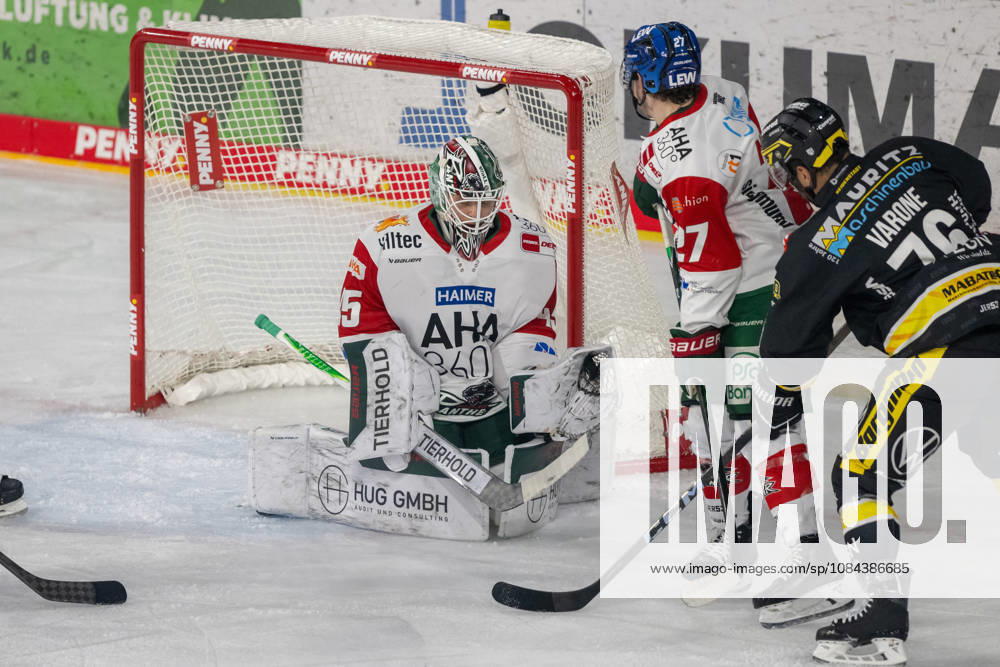 Markus Keller, Augsburg Panthers, 35, has the puck securely. Alongside him are Kyle Mayhew, Augsburg Panthers, 27, and Phil Varone, Krefeld Penguins, 76. Krefeld Penguins vs. Augsburg Panthers, ice hockey, Penny DEL, Matchday 8, 2026–2027 season, October 11, 2026 Krefeld Pinguine vs. Augsburger Panther, ice hockey, Penny DEL, Matchday 8, 2026–2027 season, October 11, 2026, Krefeld