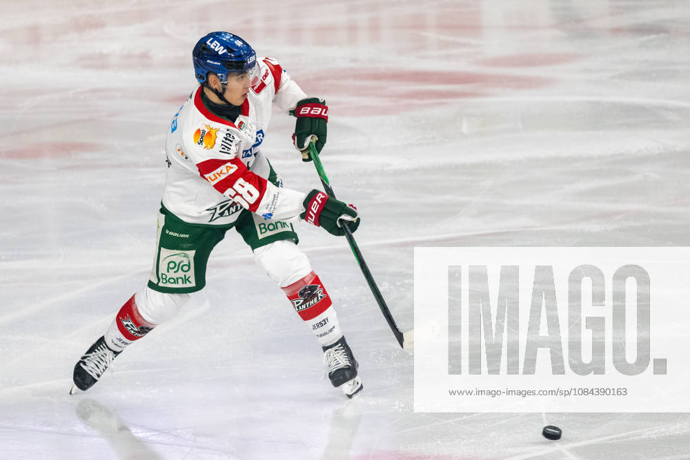 Fabrizio Pilu of the Augsburger Panther, No. 68, passes the puck forward. Krefeld Pinguine vs. Augsburger Panther, ice hockey, Penny DEL, Matchday 8, 2026–2027 season, October 11, 2026, Krefeld Pinguine vs. Augsburger Panther, ice hockey, Penny DEL, Matchday 8, 2026–2027 season, October 11, 2026, Krefeld