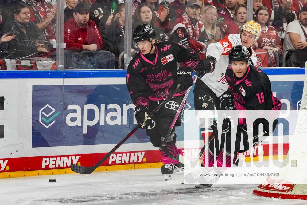 Ice Hockey: Penny DEL, Matchday 8—Cologne Sharks vs. Nuremberg Ice Tigers on October 11, 2026, at the Lanxess Arena in Cologne. Carlos Händel (Cologne), left: Josef Eham (Nuremberg), center: Frederik Storm (Cologne), right: In accordance with the regulations of the DEL (German Ice Hockey League), the publication and further use of these images in electronic media and on devices of any kind during the game is not permitted.