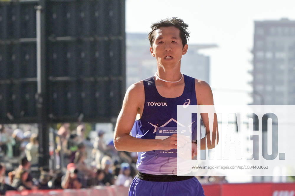 Tomoki Ota of Japan crosses the finish line with a time of 02:11:52 placing 26th over all placing during 2026 Bank of America Chicago Marathon in Chicago on Sunday, Oct. 11, 2026. CHI20261011112 MARKxBLACK
