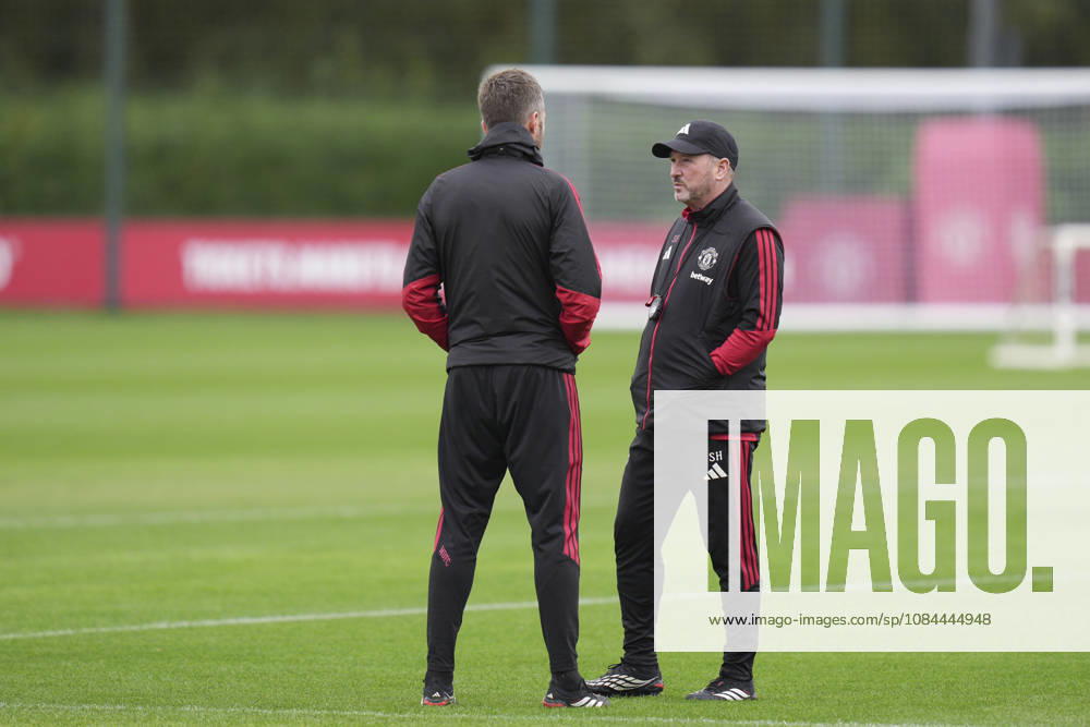 Manchester United, ManU Training, Champions League Manchester United assistant manager Steve Holland speaks with Manchester United manager Michael Carrick during the Manchester United Training Session at Carrington Training Centre, ahead of the UEFA Champions League Matchday 2 v Atletico Madrid, Manchester, England on 12 October 2026 Credit: Steve Flynn Every Second Media Editorial use only. All images are copyright Every Second Media Limited. No images may be reproduced without prior permission.