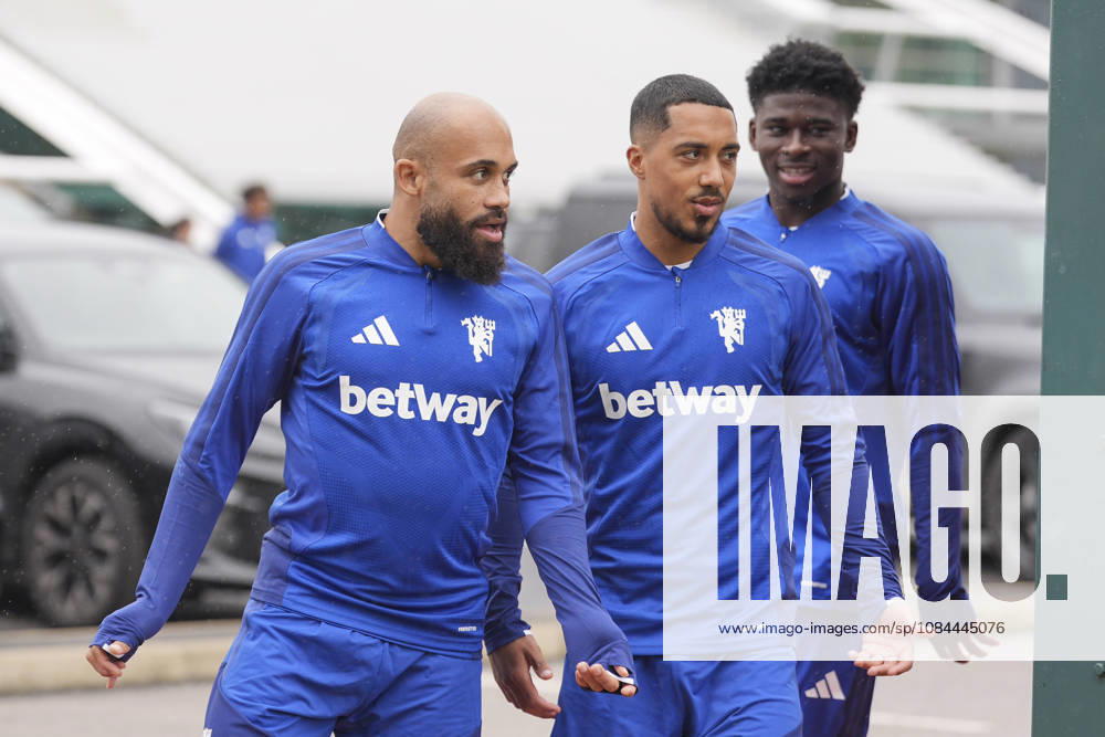 Manchester United, ManU Training, Champions League Bryan Mbeumo, Youri Tielemans and Carlos Baleba of Manchester United walk out to the training pitches before the Manchester United Training Session at Carrington Training Centre, ahead of the UEFA Champions League Matchday 2 v Atletico Madrid, Manchester, England on 12 October 2026 Credit: Steve Flynn Every Second Media Editorial use only. All images are copyright Every Second Media Limited. No images may be reproduced without prior permission.