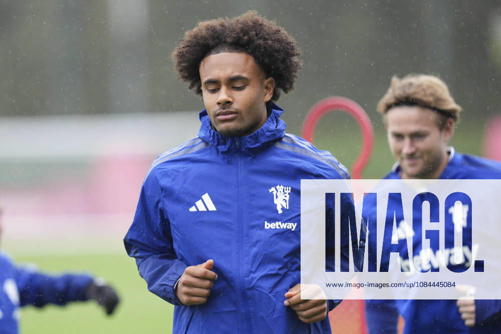 Manchester United, ManU Training, Champions League Joshua Zirkzee of Manchester United and Matthijs de Ligt of Manchester United run out to the training pitches before the Manchester United Training Session at Carrington Training Centre, ahead of the UEFA Champions League Matchday 2 v Atletico Madrid, Manchester, England on 12 October 2026 Credit: Steve Flynn Every Second Media Editorial use only. All images are copyright Every Second Media Limited. No images may be reproduced without prior permission.