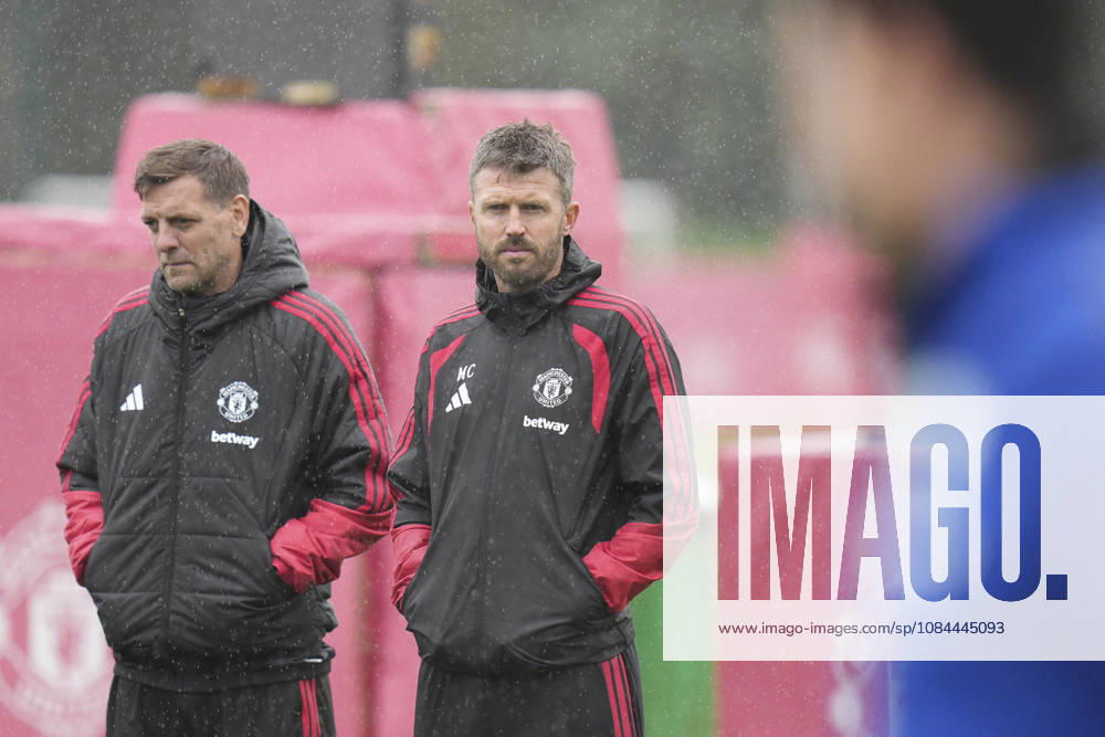 Manchester United, ManU Training, Champions League Manchester United manager Michael Carrick and Manchester United assistant manager Jonathan Woodgate watch the players warm up during the Manchester United Training Session at Carrington Training Centre, ahead of the UEFA Champions League Matchday 2 v Atletico Madrid, Manchester, England on 12 October 2026 Credit: Steve Flynn Every Second Media Editorial use only. All images are copyright Every Second Media Limited. No images may be reproduced without prior permission.