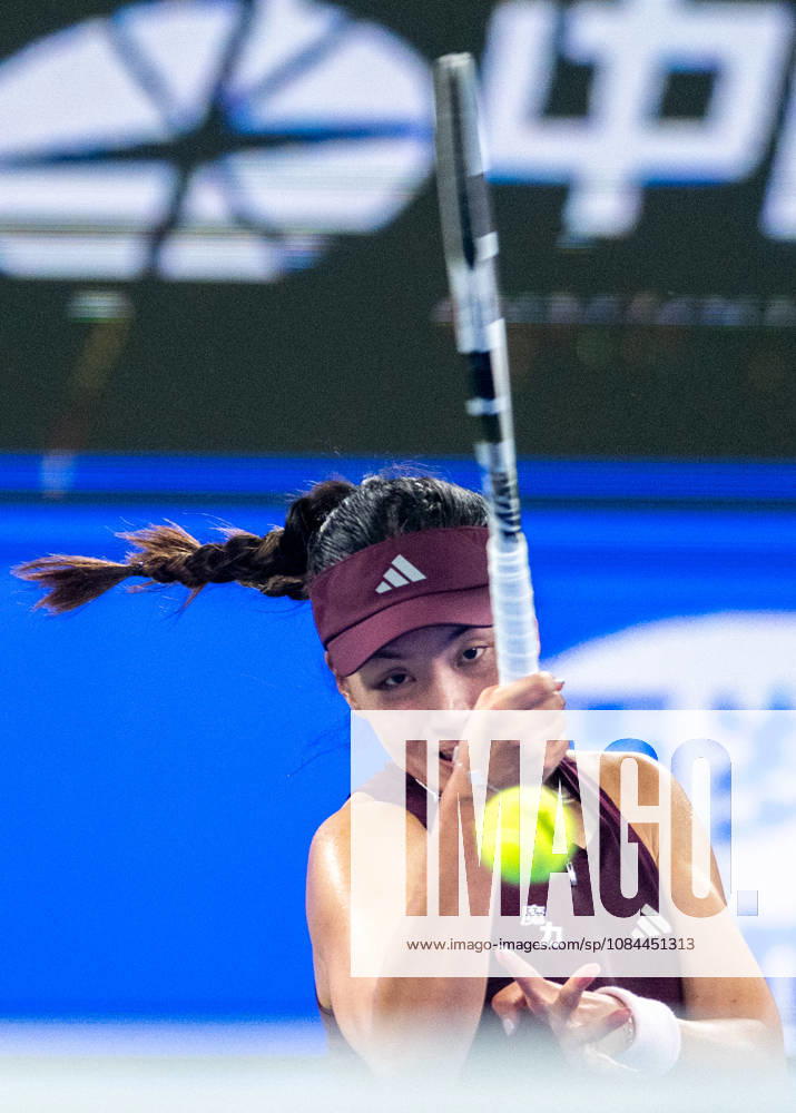 (261012) -- WUHAN, Oct. 12, 2026 -- Wang Xinyu hits a return during the women s sinlges round of 64 match between Wang Xiyu of China and Wang Xinyu of China of the 2026 Wuhan Open tennis tournament in Wuhan, capital of central China s Hubei Province, Oct. 12, 2026. ) (SP)CHINA-WUHAN-TENNIS-WUHAN OPEN-WOMEN S SINGLES-ROUND OF 64 (CN) DuxZixuan