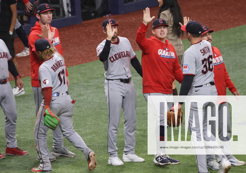 Cleveland Guardians players celebrate with closing pitcher Cade Smith (36) after the Guardians defeated the Tampa Bay Rays 7-3 in game one of the MLB, Baseball Herren, USA American League Championship Series playoff at Raymond James Stadium in Tampa, Florida, on Monday, October 12, 2026. TPB20261012718 GARYxBOGDON