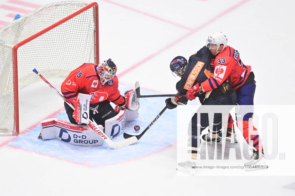 Ice hockey, Eishockey Champions League match: HC Dynamo Pardubice vs Vaxjo Lakers Hockey Club in Pardubice, Czech Republic, October 13, 2026. From left Roman Will, goalie of Pardubice, Karl Henriksson of Vaxjo, Jan Kostalek of Pardubice. (CTKxPhoto JosefxVostarek) CTKPhotoP2026101306955 CTKPhotoP2026101306955