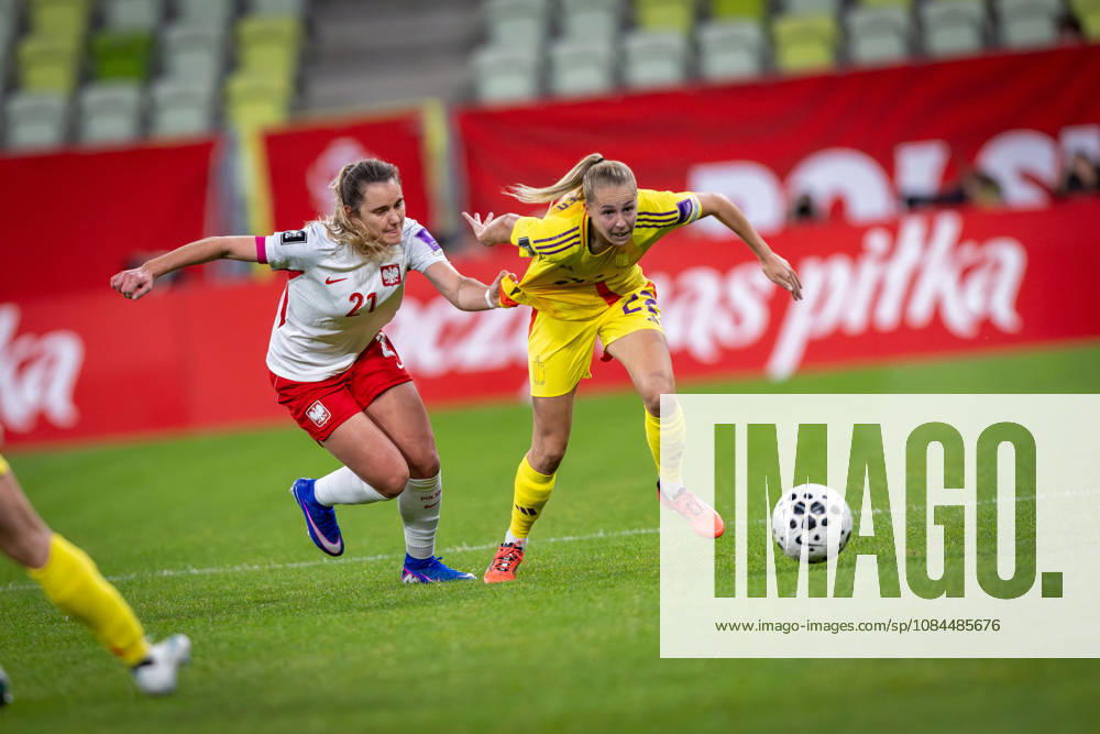 Poland player Paulina Tomasiak competes for the ball with Belgium player Sari Kees during the FIFA Womens World Cup qualifying play off match. Poland V Belgium FIFA Womens World Cup Qualifying Play Off - ZUMAl194 20261013_zip_l194_005