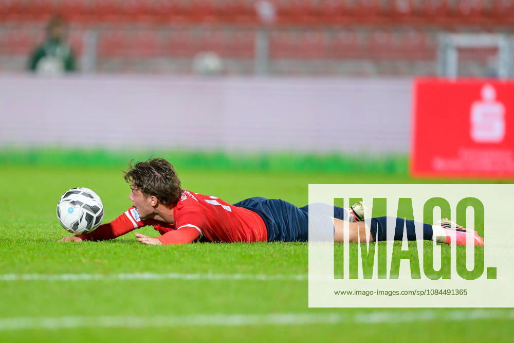 Samuel Weiss of Unterhaching, 17, is lying on the ground after a foul; free kick; single frame; action; 13 10 2026; Unterhaching, Germany; soccer; Bavarian Regional League; SpVgg Unterhaching vs. TSV 1882 Landsberg