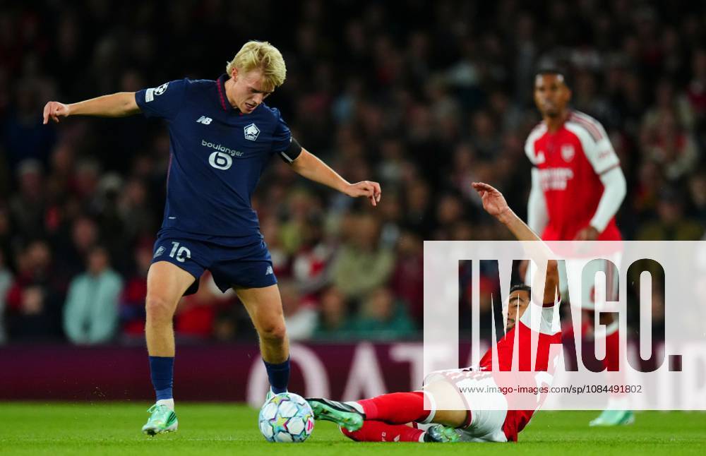Mikel Merino of Arsenal Hakon Arnar Haraldsson of Lille Arsenal v Lille, UEFA Champions League, Football, Emirates Stadium, London, UK - 13 Oct 2026London Emirates Stadium United Kingdom