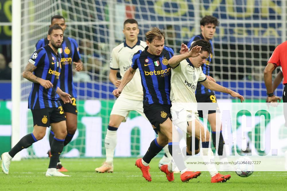Inter s Nicolo Barella and Club s Hugo Vetlesen fight for the ball during a soccer game between Italian Inter Milan and Belgian Club Brugge KV, Tuesday 13 October 2026 in Milan, Italy, on day 2 of the UEFA Champions League league phase. BRUNOxFAHY x189713925x