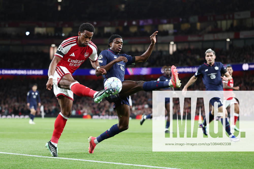 London, England, 13th October 2026. Jurrien Timber of Arsenal tussles with Nathan Ngoy of LOSC Lille during the Arsenal vs LOSC Lille UEFA Champions League match at the Emirates Stadium, London. Picture credit should read: David Klein Sportimage . SPI_027_DK_Arsenal_Lille SPI-5065-0028