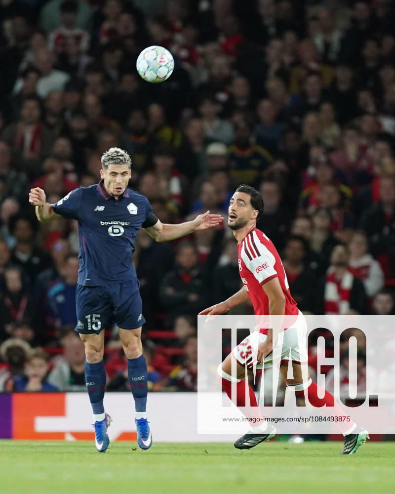 Arsenal v Lille OSC, UEFA Champions League Romain Perraud of Lille under pressure from Mikel Merino of Arsenal during Arsenal v Lille OSC UEFA Champions League matchday 2 at the Emirates Stadium, London, England on 13 October 2026 Credit: Dylan Hepworth Every Second Media Editorial use only. All images are copyright Every Second Media Limited. No images may be reproduced without prior permission.
