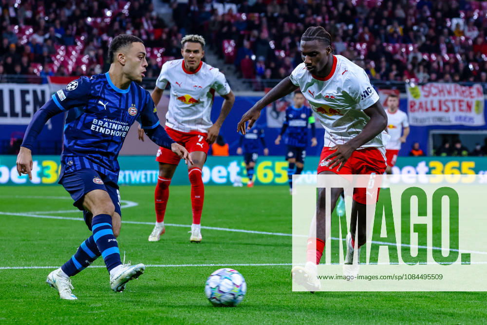 Sergino Dest (PSV Eindhoven), 08 on the ball, tackle, duel, battle; Ezechiel Banzuzi (RB Leipzig), 06, GER, RB Leipzig vs. PSV Eindhoven, soccer, UEFA Champions League, Matchday 2, 2026–2027 season, October 13, 2026, GER, RB Leipzig vs. PSV Eindhoven, soccer, UEFA Champions League, Matchday 2, 2026–2027 season, October 13, 2026, Germany