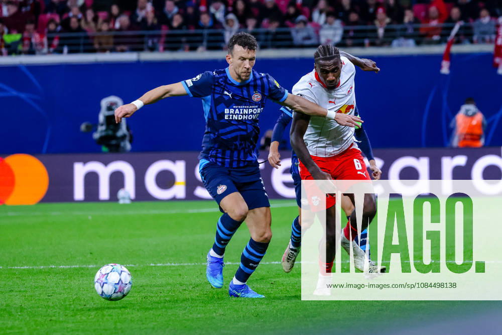 Tackle, duel, battle between Ivan Perisic (PSV Eindhoven, 05) and Ezechiel Banzuzi (RB Leipzig, 06) for the ball, GER, RB Leipzig vs. PSV Eindhoven, soccer, UEFA Champions League, Matchday 2, 2026–2027 season, October 13, 2026, GER, RB Leipzig vs. PSV Eindhoven, soccer, UEFA Champions League, Matchday 2, 2026–2027 season, October 13, 2026, Germany