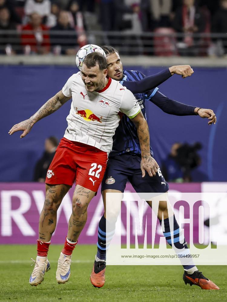 LEIPZIG - (lr) David Raum of RB Leipzig and Armando Obispo of PSV Eindhoven jump for the ball during the UEFA Champions League match between RB Leipzig and PSV Eindhoven at the RB Arena on October 13, 2026 in Leipzig, Germany. MAURICE VAN STEEN ANP ANPxSportx IVx 572360823 originalFilename: 572360823