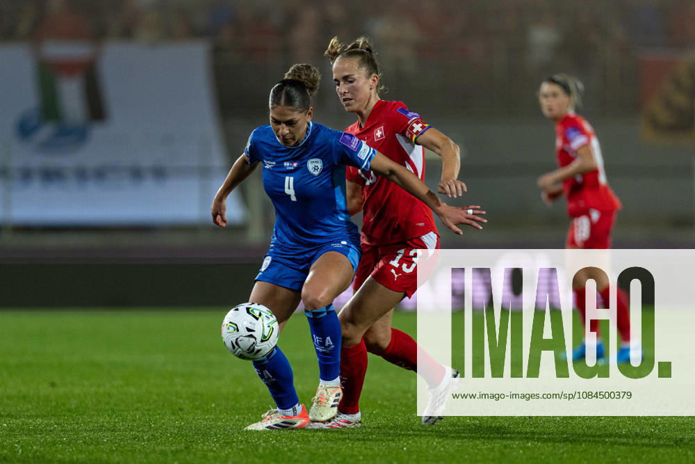 SION, SWITZERLAND, OCTOBER 13 : Duel between Itaf Alkisi of Israel and Lia Wälti of Switzerland during the FIFA Women s World Cup 2027 Women s European Qualifiers Play-offs game between Switzerland and Israel at Stade de Tourbillon on October 13, 2026 in Sion, Switzerland.