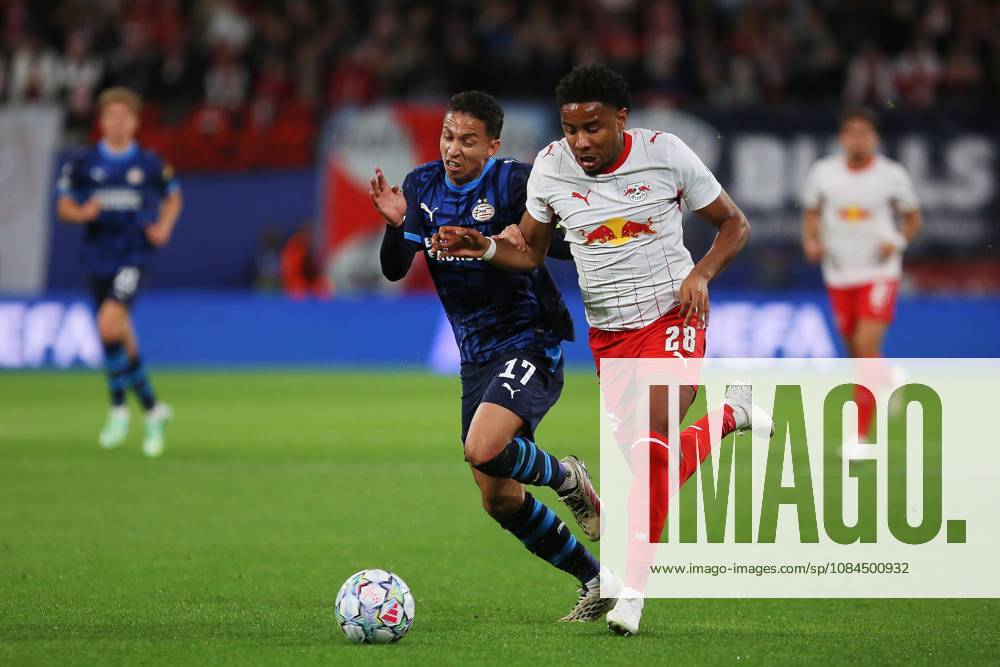 Leipzig, Saxony, Germany, October 13, 2026, Red Bull Arena, 2026 UEFA Champions League, RB Leipzig vs. PSV Eindhoven, Mauro Junior (17), Eindhoven, and Christopher Nkunku (28), RBL