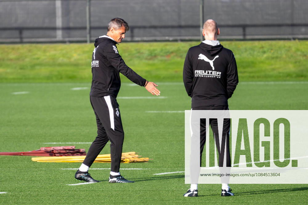 Alexander Blessin of Borussia Mönchengladbach, head coach, in conversation with Niklas Lanwehr of Borussia Mönchengladbach, assistant coach; public training session for Borussia Mönchengladbach, soccer, Bundesliga, 2026–2027 season, October 14, 2026, public training session for Borussia Mönchengladbach, soccer, Bundesliga, 2026–2027 season, October 14, 2026, Mönchengladbach