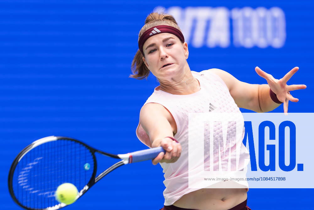 2026 WTA, Tennis Damen Wuhan Open: Karolina Muchova - Caty McNally in China - 14 Oct. Karolina Muchova of Czechia seen in action with Caty McNally of USA (Not in view) during the Wuhan Open final match at the Optics Valley International Tennis Center. Karolina Muchova defeated Caty McNally with a score of 3-6, 7-6, 7-6. Wuhan China