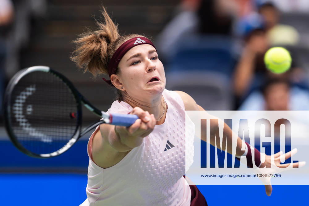 KAROLINA MUCHOVA of Czechia in action against C. McNally of the USA during their Wuhan Open match at the Optics Valley International Tennis Center. Muchova defeated McNally 3:6, 7:6, 7:6. Wuhan China - ZUMAs197 20261014_aaa_s197_021