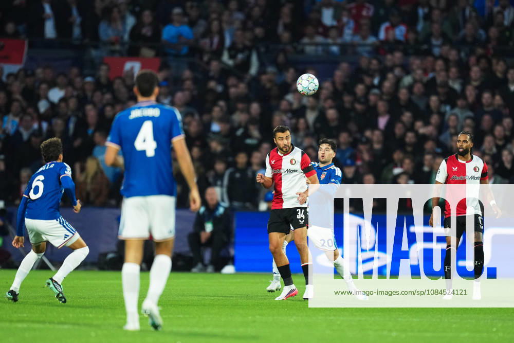 UEFA Champions League: Feyenoord Rotterdam v Como 1907 Rotterdam - Charles Vanhoutte, Martin Baturina of Como, Jeremiah st Juste of Feyenoord during the MD 2 League Phase competition round of the 2026 2027 UEFA Champions League season. The match is set between Feyenoord Rotterdam and Como 1907 at Stadion Feijenoord on 14 October 2026 in Rotterdam, Netherlands.
