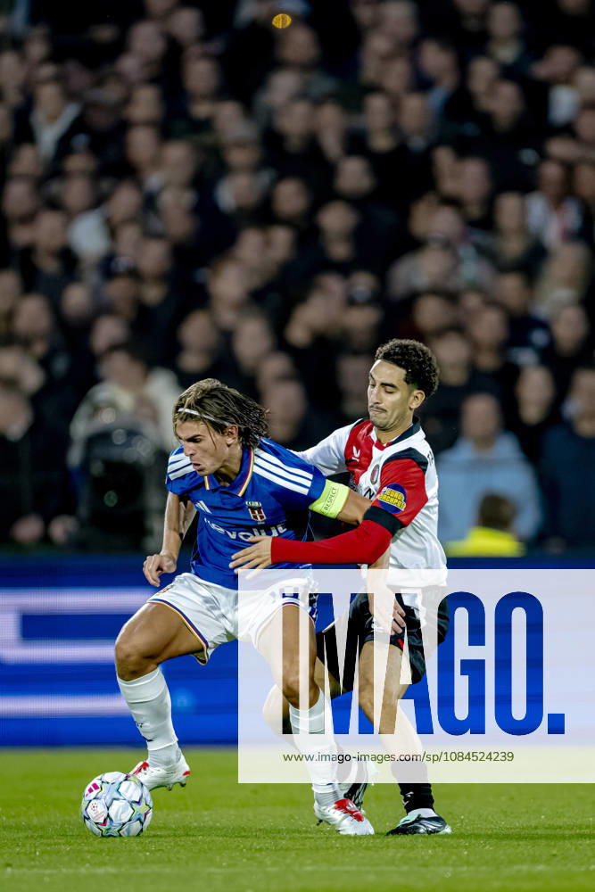 ROTTERDAM: Como midfielder Nicolás Paz and Feyenoord midfielder Oussama Targhalline during the UEFA Champions League match between Feyenoord and Como at De Kuip on October 14, 2026, in Rotterdam, Netherlands. Photo by DeFodi Images