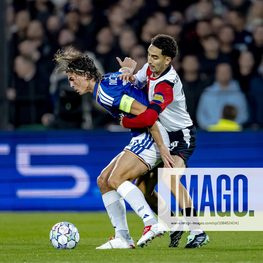 ROTTERDAM: Como midfielder Nicolás Paz and Feyenoord midfielder Oussama Targhalline during the UEFA Champions League match between Feyenoord and Como at De Kuip on October 14, 2026, in Rotterdam, Netherlands. Photo by DeFodi Images