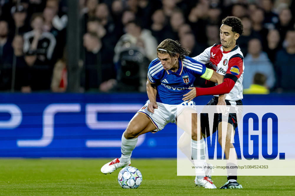 ROTTERDAM: Como midfielder Nicolás Paz and Feyenoord midfielder Oussama Targhalline during the UEFA Champions League match between Feyenoord and Como at De Kuip on October 14, 2026, in Rotterdam, Netherlands. Photo by DeFodi Images