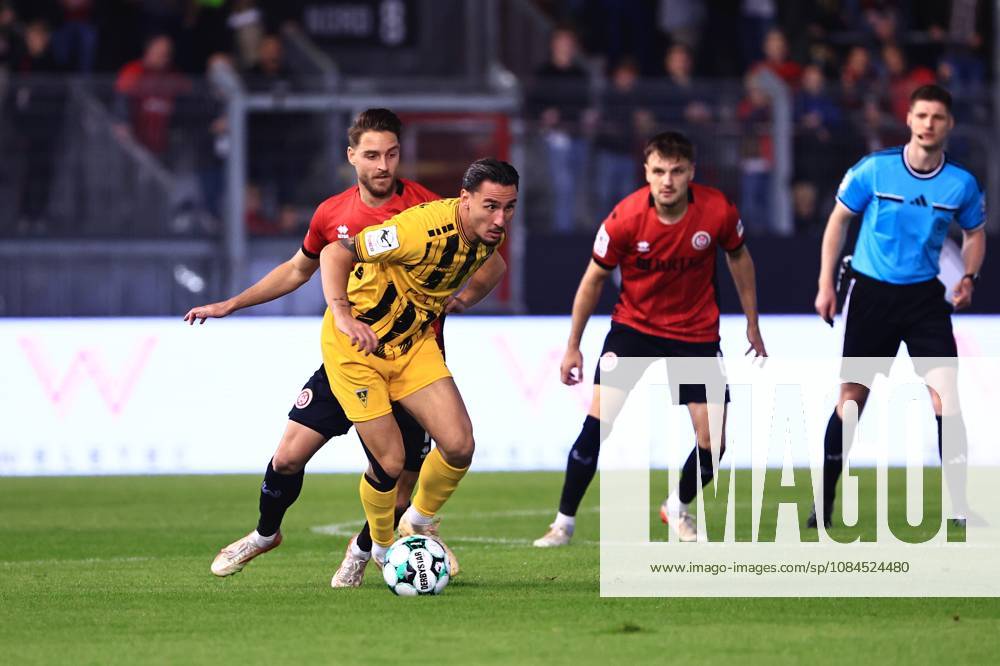 Petros Bagkalianis (Alemannia Aachen, No. 02) in a tackle with Lukas Schleimer (SV Wehen Wiesbaden, No. 07), GER, SV Wehen Wiesbaden vs. Alemannia Aachen, soccer, 3. Liga, Matchday 9, 2026–2027 season, October 14, 2026 DFB regulations prohibit any use of photographs as image sequences and or quasi-video GER, SV Wehen Wiesbaden vs. Alemannia Aachen, soccer, 3rd Division, Matchday 9, 2026–2027 season, October 14, 2026, Wiesbaden