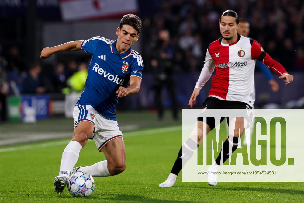 2026-10-14 Feyenoord v Como - UEFA Champions League, league phase, matchday 2 ROTTERDAM, NETHERLANDS - OCTOBER 14: Jacobo Ramon of Como is challenged by Anis Hadj Moussa of Feyenoord during the UEFA Champions League, league phase, matchday 2 match between Feyenoord and Como at Stadion Feijenoord on October 14, 2026 in Rotterdam, Netherlands. Rotterdam Stadion Feijenoord Netherlands Content not available for redistribution in The Netherlands directly or indirectly through any third parties.