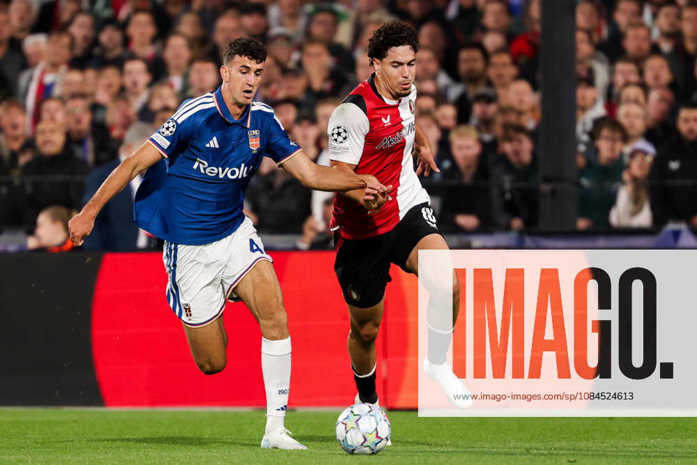2026-10-14 Feyenoord v Como - UEFA Champions League, league phase, matchday 2 ROTTERDAM, NETHERLANDS - OCTOBER 14: Nacho Ferri of Feyenoord battles for the ball with Jacobo Ramon of Como during the UEFA Champions League, league phase, matchday 2 match between Feyenoord and Como at Stadion Feijenoord on October 14, 2026 in Rotterdam, Netherlands. Rotterdam Stadion Feijenoord Netherlands Content not available for redistribution in The Netherlands directly or indirectly through any third parties.
