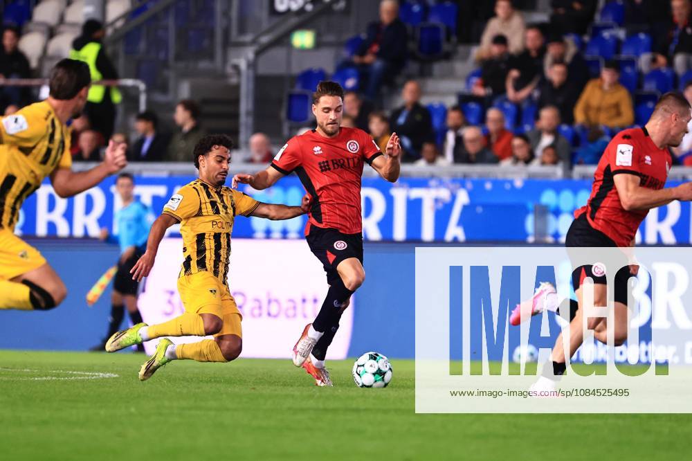 Mehdi Loune of Alemannia Aachen, No. 10, in a tackle with Lukas Schleimer of SV Wehen Wiesbaden, No. 07 (GER), SV Wehen Wiesbaden vs. Alemannia Aachen, soccer, 3. Liga, Matchday 9, 2026–2027 season, October 14, 2026 DFB regulations prohibit any use of photographs as image sequences and or quasi-video GER, SV Wehen Wiesbaden vs. Alemannia Aachen, soccer, 3rd Division, Matchday 9, 2026–2027 season, October 14, 2026, Wiesbaden