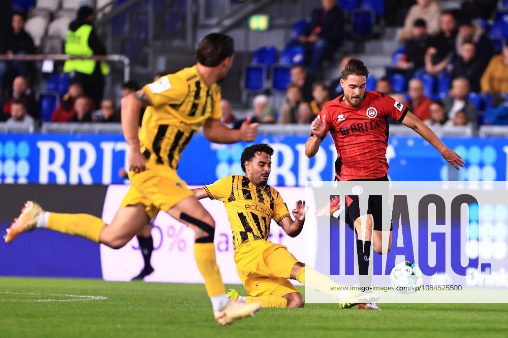 Mehdi Loune of Alemannia Aachen, No. 10, in a tackle with Lukas Schleimer of SV Wehen Wiesbaden, No. 07 (GER), SV Wehen Wiesbaden vs. Alemannia Aachen, soccer, 3. Liga, Matchday 9, 2026–2027 season, October 14, 2026 DFB regulations prohibit any use of photographs as image sequences and or quasi-video GER, SV Wehen Wiesbaden vs. Alemannia Aachen, soccer, 3rd Division, Matchday 9, 2026–2027 season, October 14, 2026, Wiesbaden