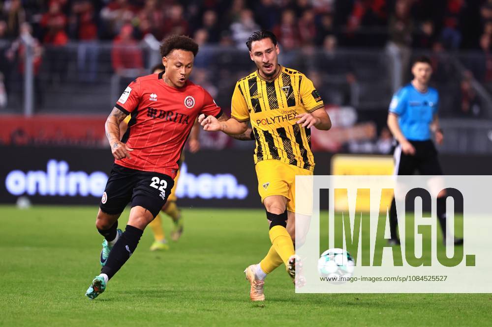 Petros Bagkalianis of Alemannia Aachen, No. 02, in a tackle with Roberto Massimo of SV Wehen Wiesbaden, No. 22 (GER), SV Wehen Wiesbaden vs. Alemannia Aachen, soccer, 3. Liga, Matchday 9, 2026–2027 season, October 14, 2026 DFB regulations prohibit any use of photographs as image sequences and or quasi-video GER, SV Wehen Wiesbaden vs. Alemannia Aachen, soccer, 3rd Division, Matchday 9, 2026–2027 season, October 14, 2026, Wiesbaden