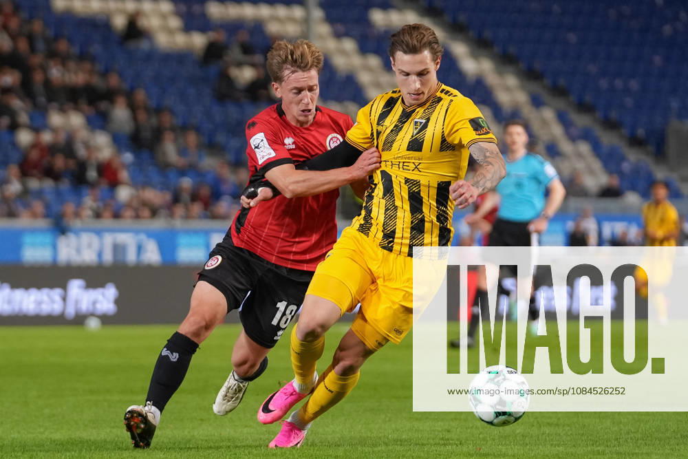 Germany Soccer 3rd Division 2026–2027, Matchday 9: SV Wehen Wiesbaden vs. TSV Alemannia Aachen at Brita Arena, Wiesbaden; Fabian Greilinger (SVWW), No. 18, in a tackle with Daniel Starodid (TSV), No. 9