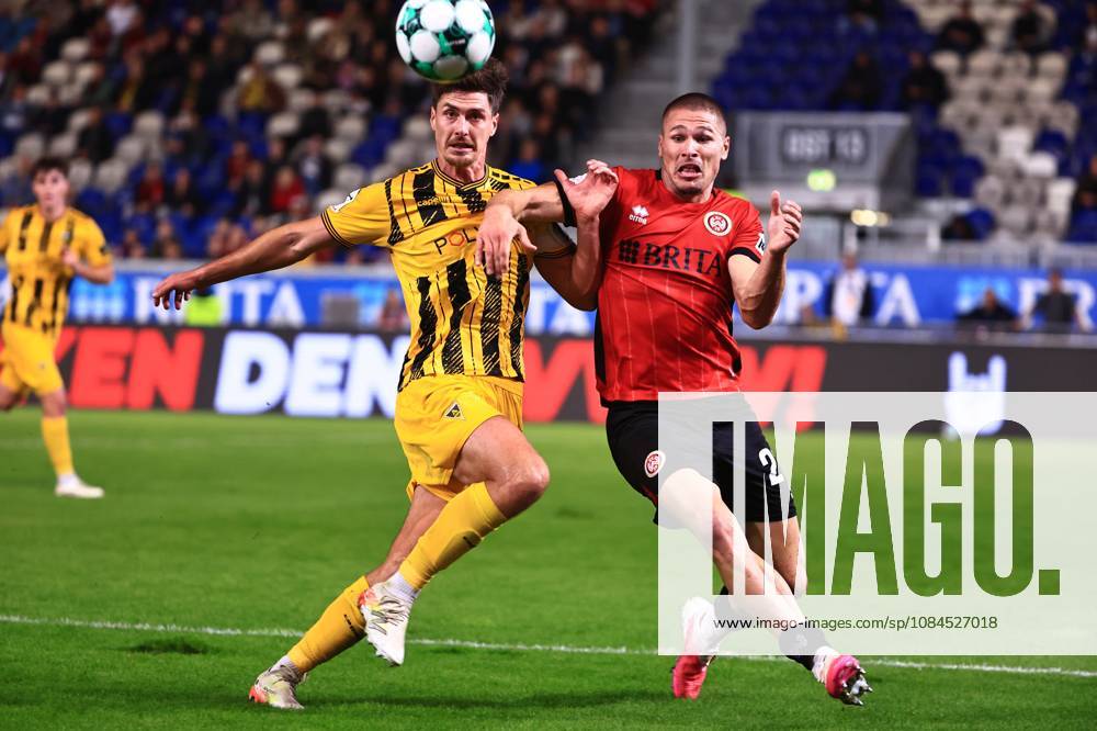 Danilo Wiebe of Alemannia Aachen, 28, in a tackle with Marcus Mueller of SV Wehen Wiesbaden, 21 (GER), SV Wehen Wiesbaden vs. Alemannia Aachen, soccer, 3rd Division, Matchday 9, 2026–2027 season, October 14, 2026 DFB regulations prohibit any use of photographs as image sequences and or quasi-video GER, SV Wehen Wiesbaden vs. Alemannia Aachen, soccer, 3rd Division, Matchday 9, 2026–2027 season, October 14, 2026, Wiesbaden