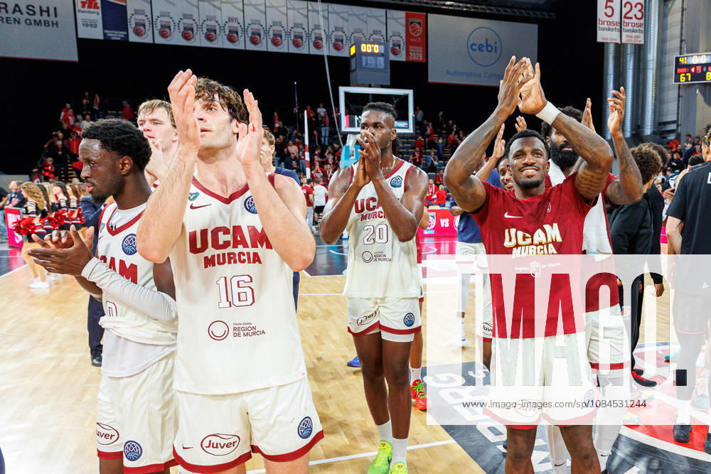 Jean Marc Pansa, UCAM Murcia, 20, Dylan Ennis, UCAM Murcia, 31, celebrating, cheers, positive emotions, positive emotion, end of the game, BMA365 Bamberg Baskets vs. UCAM Murcia, basketball, Basketball Champions League, Matchday 3, October 14, 2026 BMA365 Bamberg Baskets vs. UCAM Murcia, basketball, Basketball Champions League, Matchday 3, October 14, 2026 Bamberg