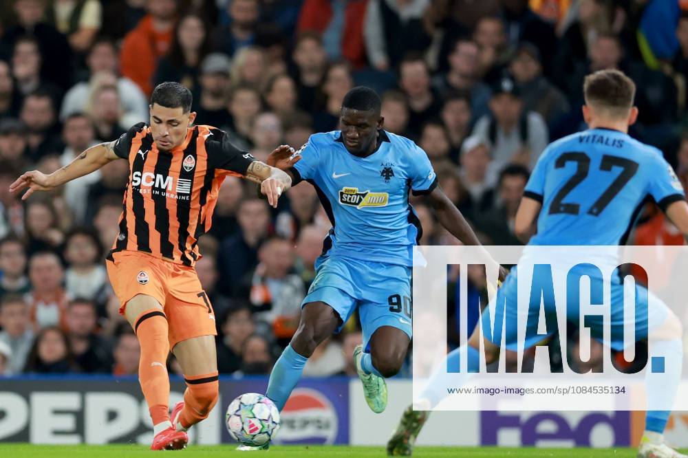 Newerton of Shakhtar Donetsk in action against Antonio Zini of AEK Athens Shakhtar Donetsk v AEK, UEFA Champions League, Football, Stamford Bridge, London, UK - 14 Oct 2026London Stamford Bridge United Kingdom
