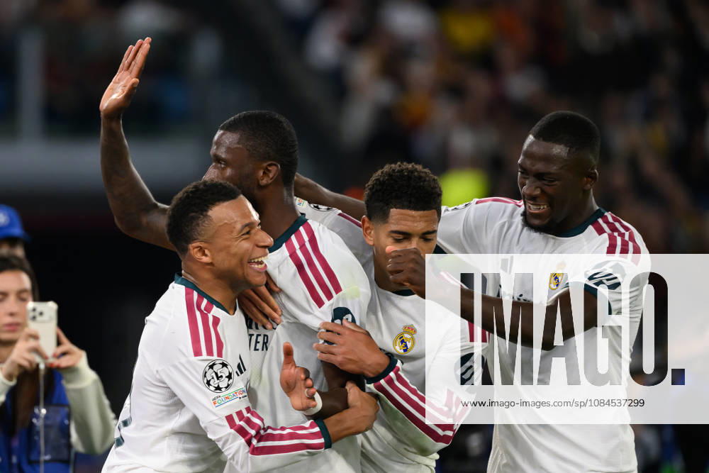 Antonio Rudiger of Real Madrid celebrates with Jude Bellingham and Kylian Mbappe after scoring the goal of 3-4 during the UEFA Champions League 2026 2027 football match between AS Roma and Real Madrid at Stadio Olimpico in Rome (Italy), October 14, 2026. AndreaxStaccioli