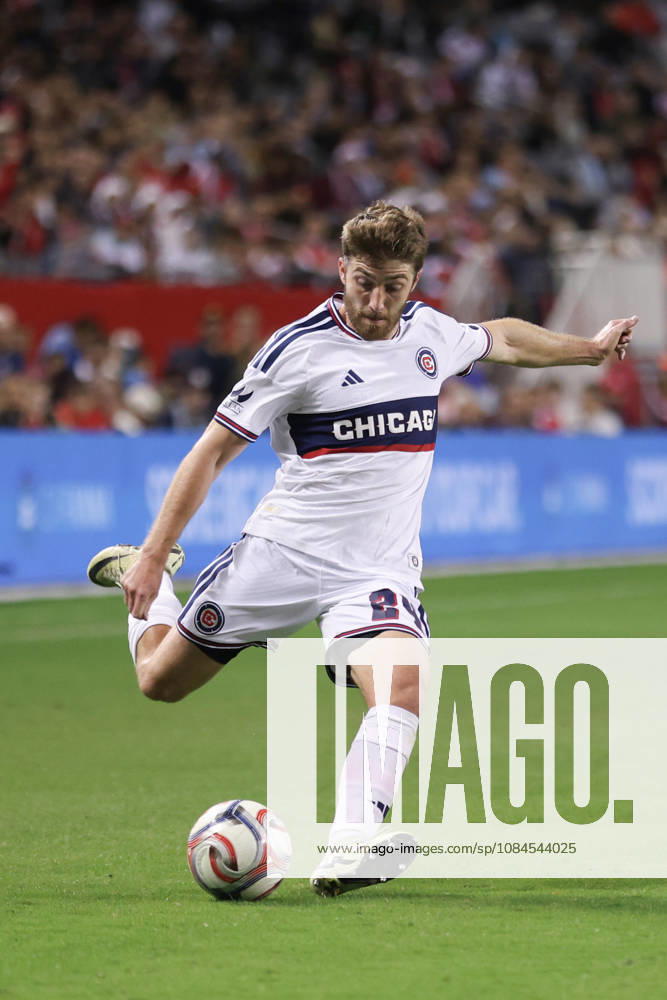 Jonathan Dean (24 Chicago Fire FC) shoots the ball during the Major League Soccer game between Chicago Fire FC and the Philadelphia Union at Soldier Field on Wednesday October 14 in Chicago, USA